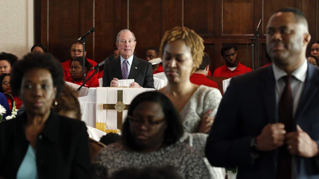 People turn their backs on Democratic presidential candidate Mike Bloomberg as he speaks at Brown Chapel AME church, Sunday, 1 March, 2020, Selma, Alabama.