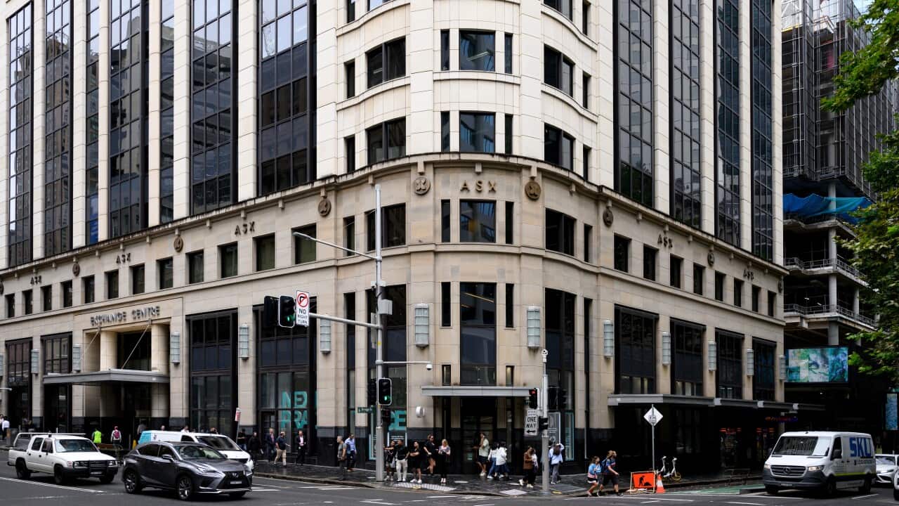 An exterior of a large building with Exchange Centre and ASX written on it.