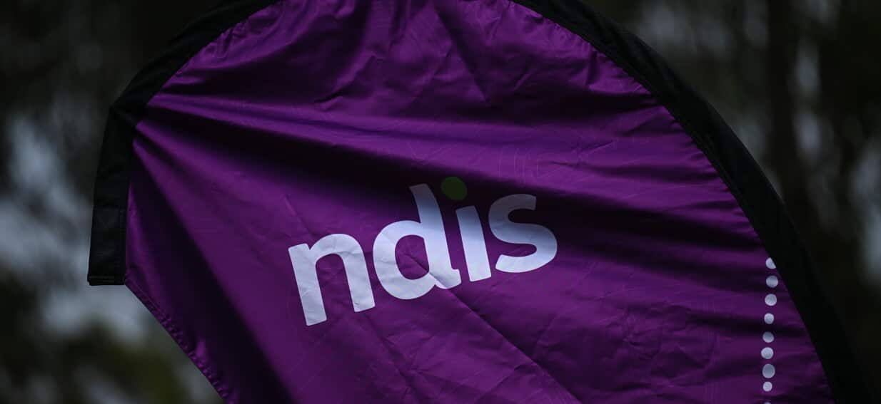 Controversial NDIS changes get last-minute green light as Labor cuts deal with Coalition