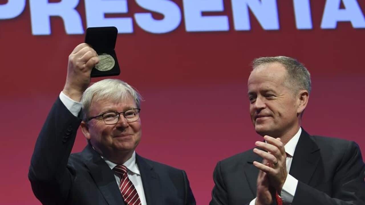 Former PM Kevin Rudd is congratulated by Labor leader Bill Shorten