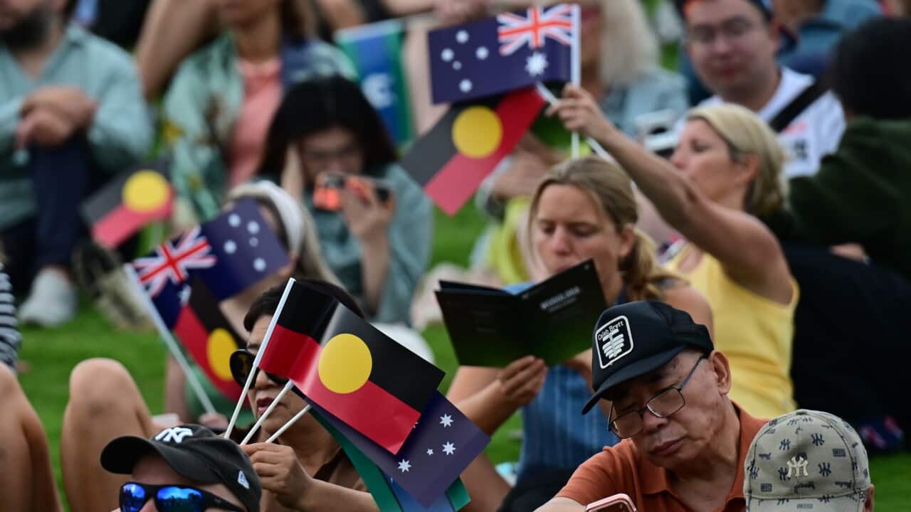 Spectators attend The WugulOra Morning Ceremony at Barangaroo Reserve during Australia Day 2026 celebrations