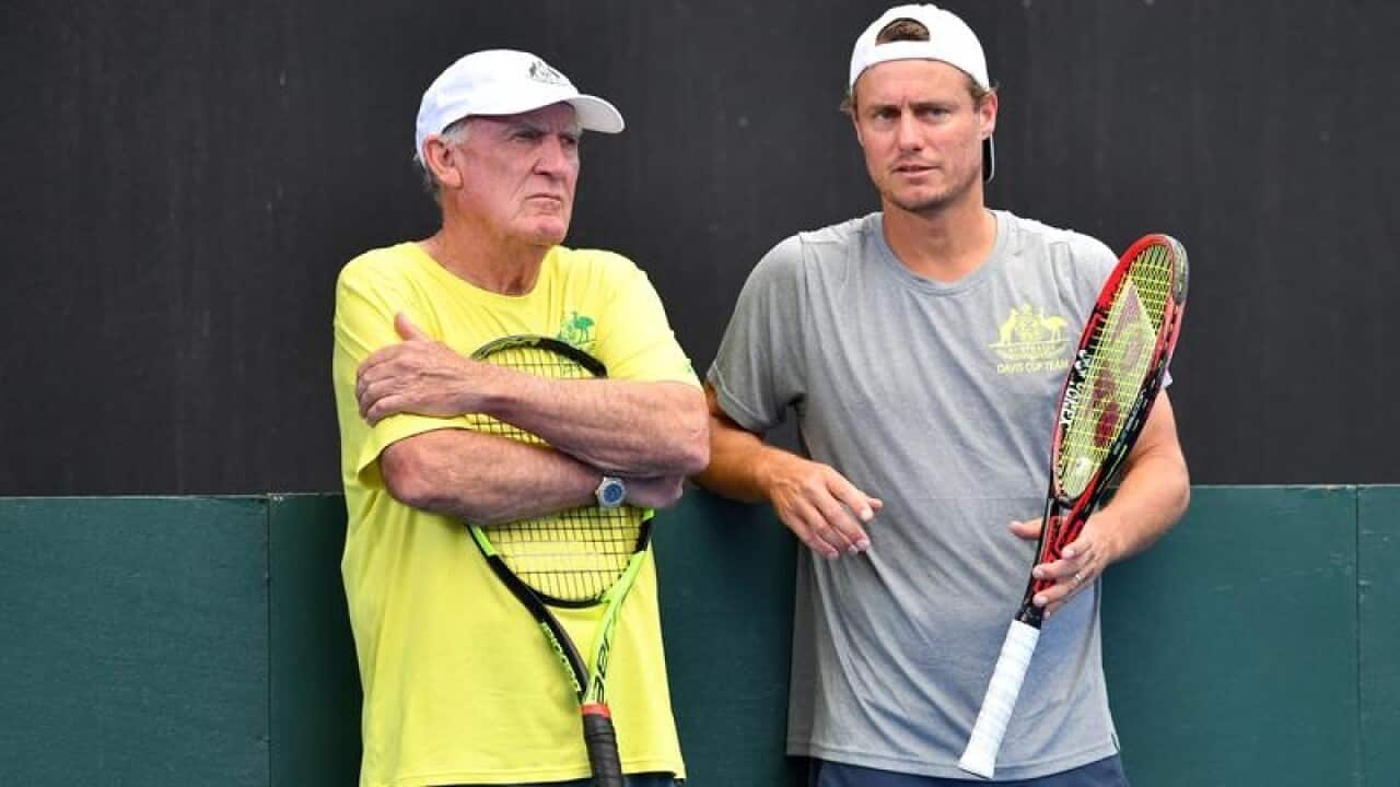 Former player Tony Roche and Australian team captain Lleyton Hewitt