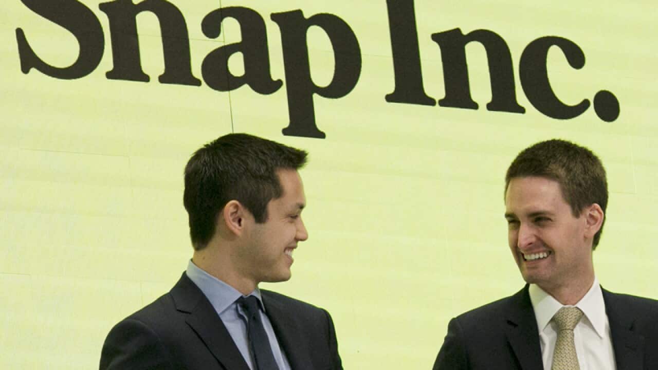Snapchat co-founders Bobby Murphy (L) and CEO Evan Spiegel