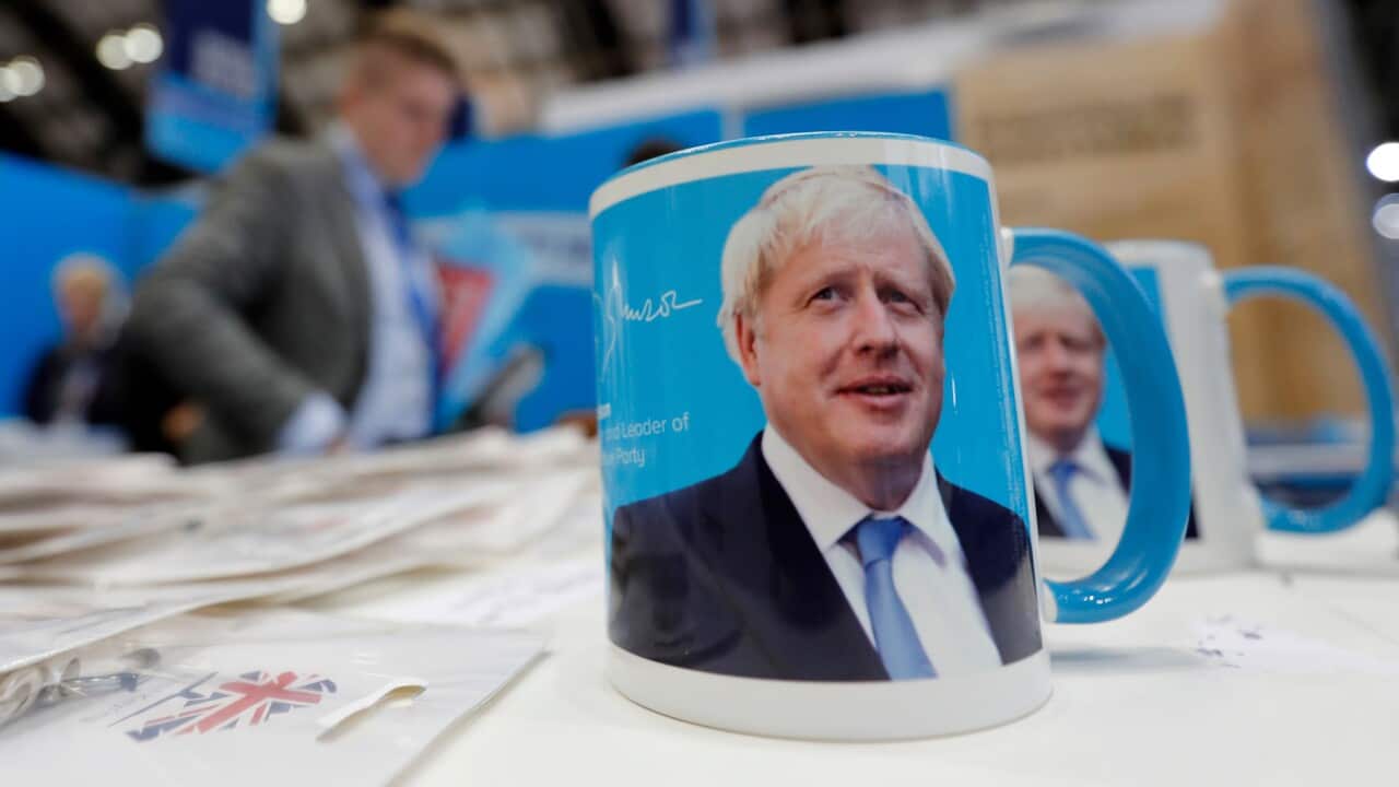 Mugs with a portrait of Boris Johnson are on sale at the Conservative Party Conference