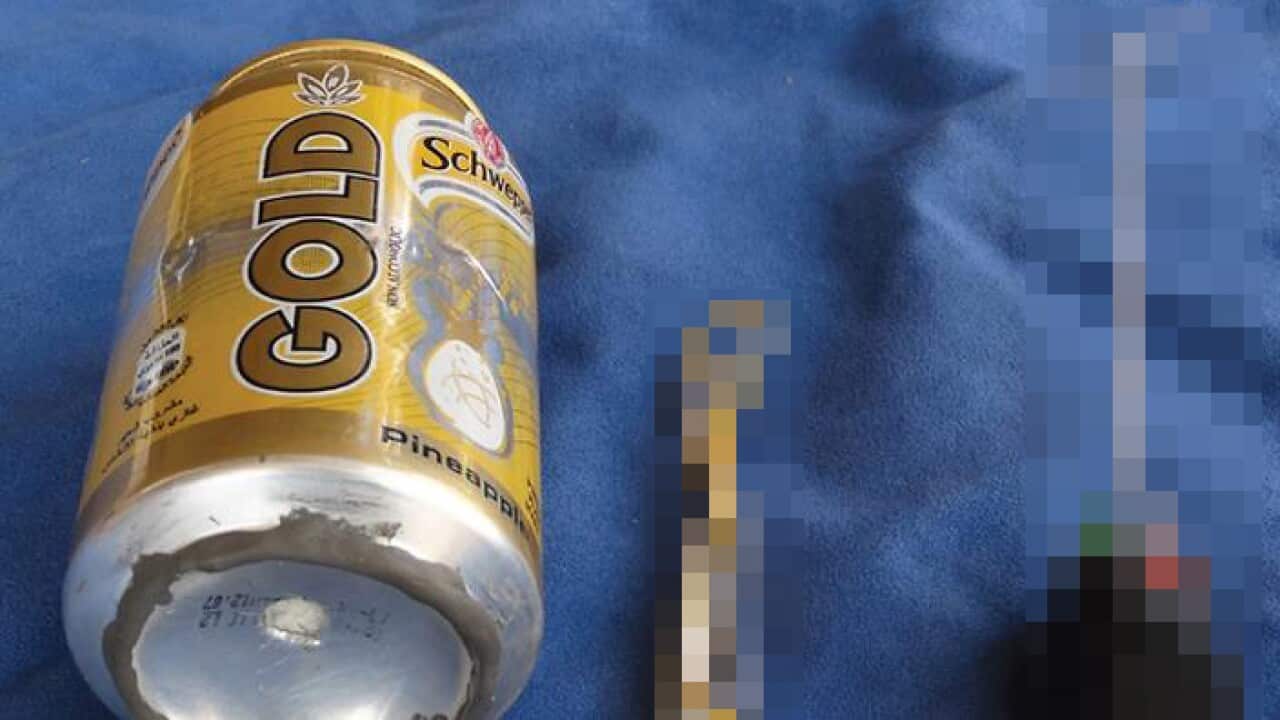 An undated handout photograph made on 18 November 2015 from the Islamic State 'Dabiq' magazine shows according to ISIS the components that were used to build the bomb that brought down a Russian passenger jet departing Egypt last month.