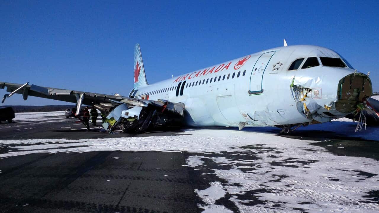 This photo provided by the Transportation Safety Board of Canada shows a Air Canada Airbus A-320 at Halifax International Airport after making an "abrupt" landing and skidding off the runway in bad weather (AP Photo/The Transportation Safety Board of Cana