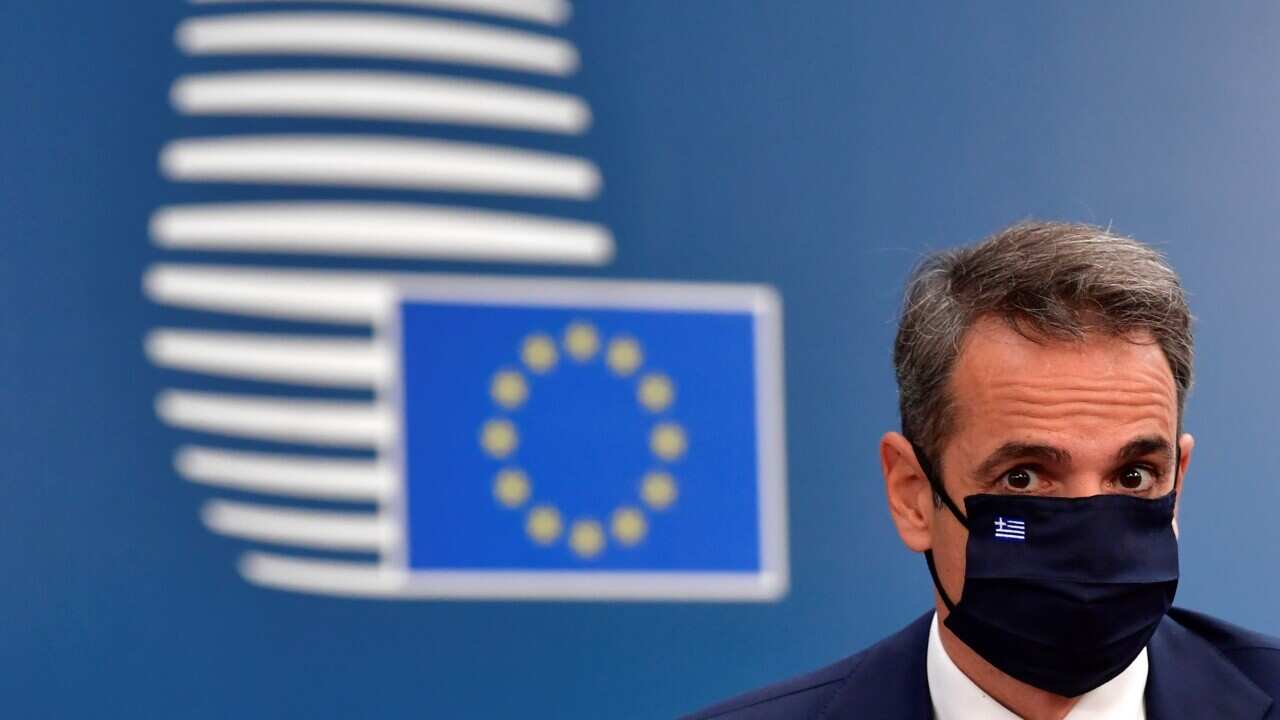 Greece's Prime Minister Kyriakos Mitsotakis arrives for the third day of the European Council in Brussels, Belgium, 19 July 2020.