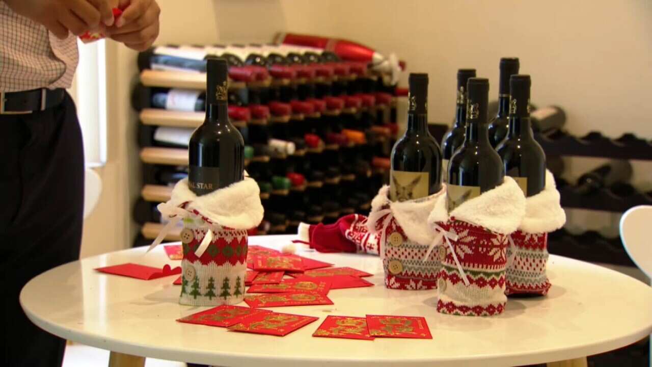 Raymond Leung preparing Lunar New Year gifts (SBS).jpg