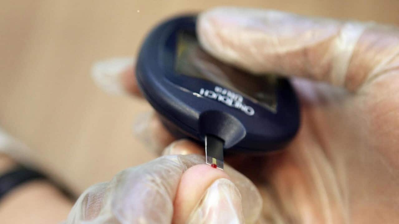a patient undergoing a blood test for diabetes