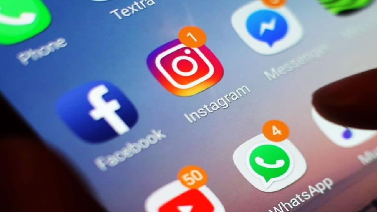 Social media icons displayed on a mobile phone screen