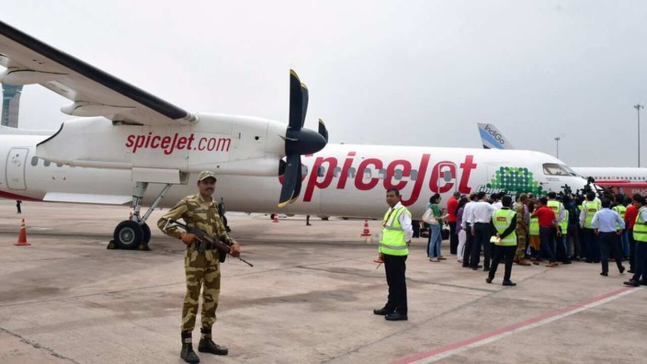 The SpiceJet Bombardier (DHC-8) Q400 passenger plane on the tarmac of the New Delhi Airport which was flown partially by bio-fuel