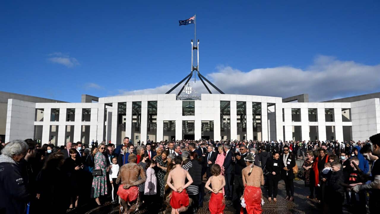 A smoking ceremony is held in the forecourt during the opening of the 47th Federal Parliament at Parliament House in Canberra, Tuesday, July 26, 2022. (AAP Image/Mick Tsikas) NO ARCHIVING