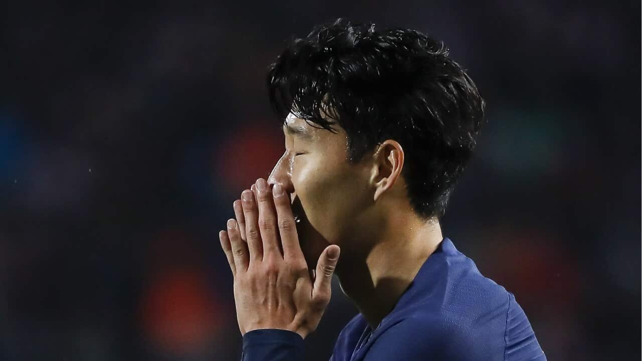 Son Heung-min prays for Andre Gomes' recovery from a horrific injury in his goal ceremony.