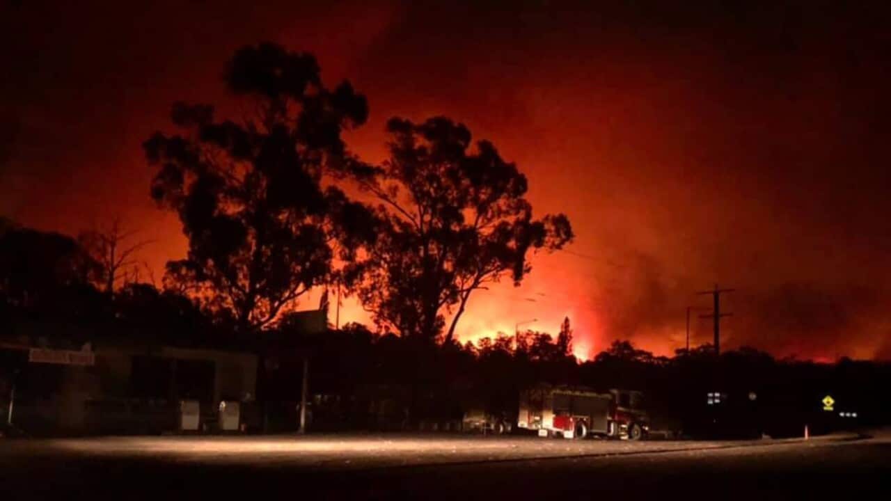A supplied image obtained Wednesday, January 1, 2020 shows a bushfire near Nowa Nowa general store in Nowa Nowa, East Gippsland, Tuesday, December 31, 2019. (AAP Image/Supplied by Nowa Nowa General Store) NO ARCHIVING, EDITORIAL USE ONLY
