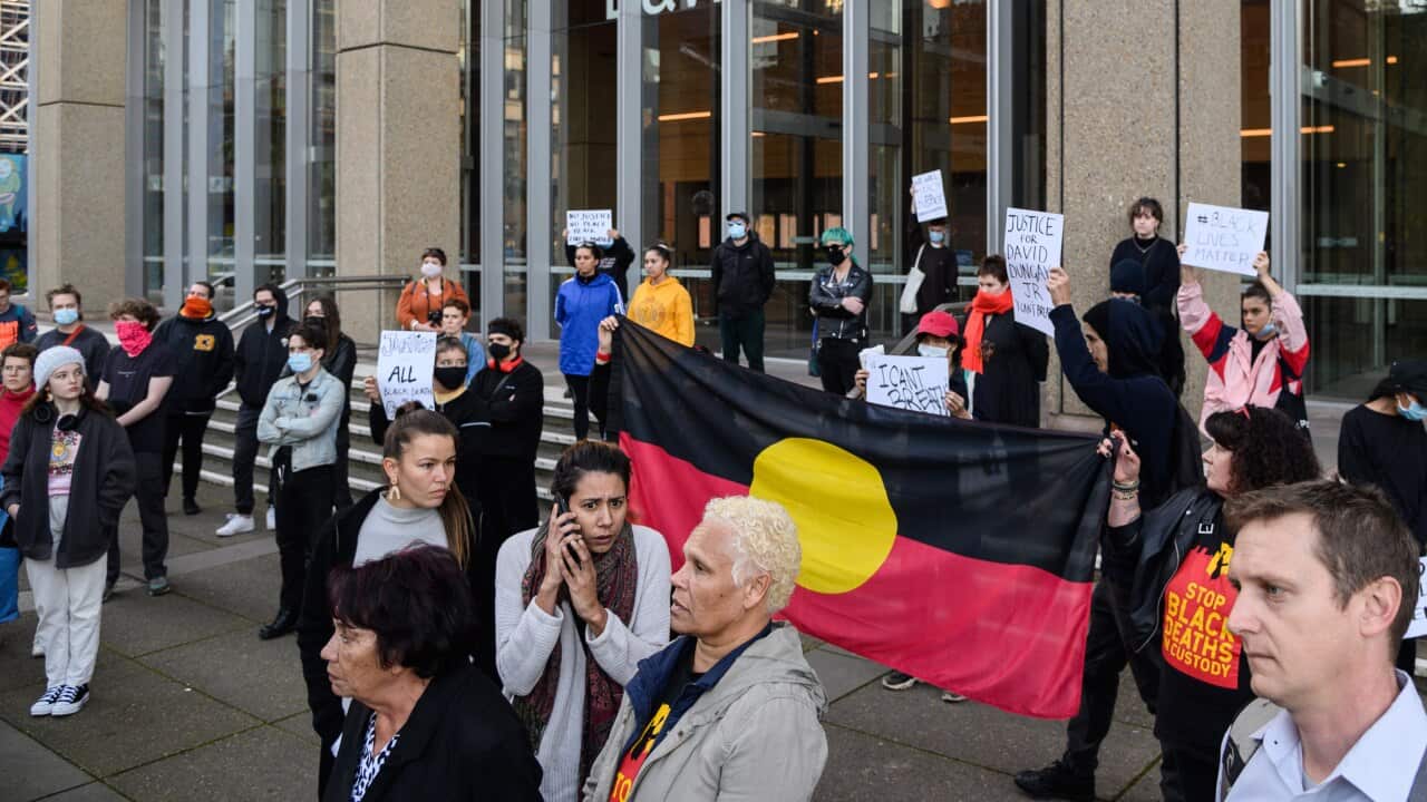 Supporters of the Black Lives Matter protest group outside the Supreme Court in Sydney on Friday.