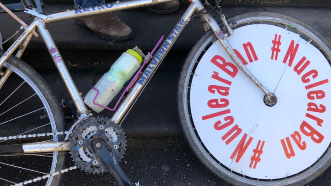 A group of cyclists have begun a 900 kilometre journey to Canberra to urge Australia to sign the nuclear ban treaty.