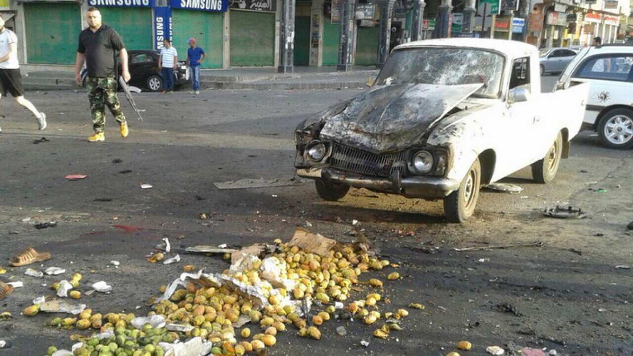The site of a suicide bombing in Sweida, in Southern Syria, 25 July 2018.