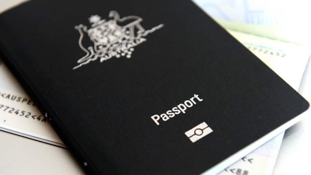 An Australian passport pictured in Brisbane, Thursday, July 25, 2013. (AAP Image/Dan Peled) NO ARCHIVING