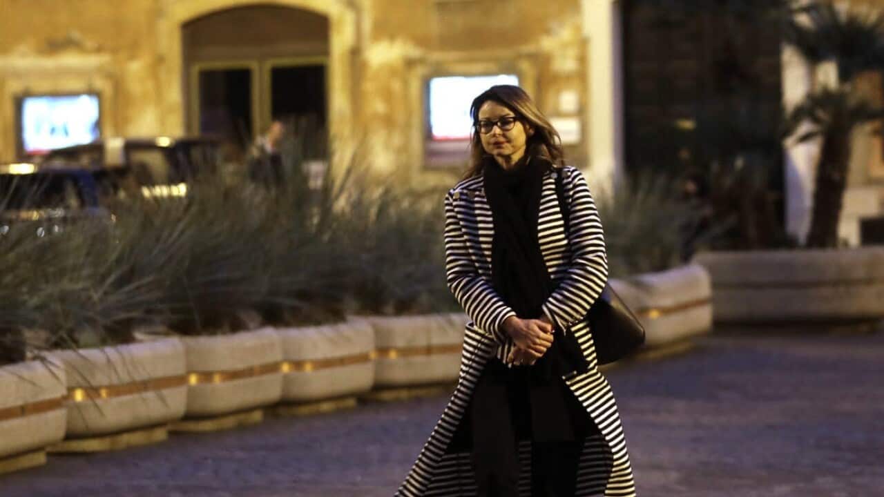 Lucia Annibali, victim of an acid attack in Italy, walks in Rome earlier this year.