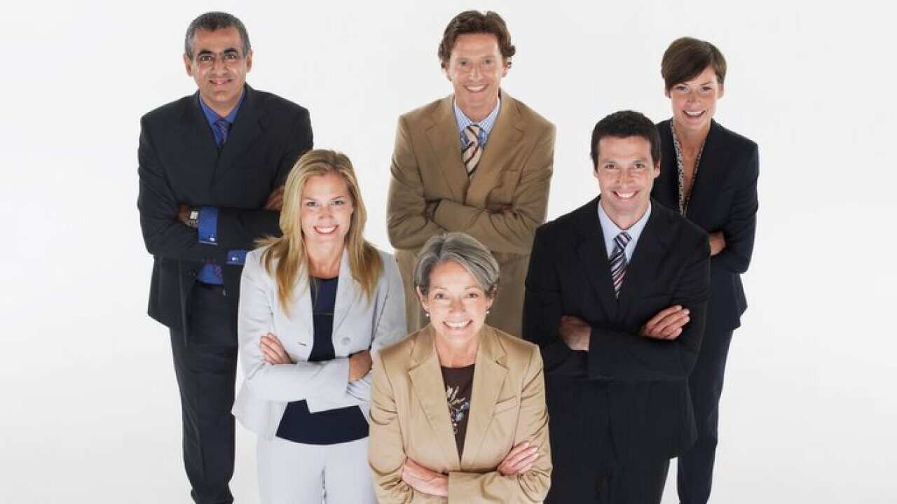 Group of businesspeople in triangle formation