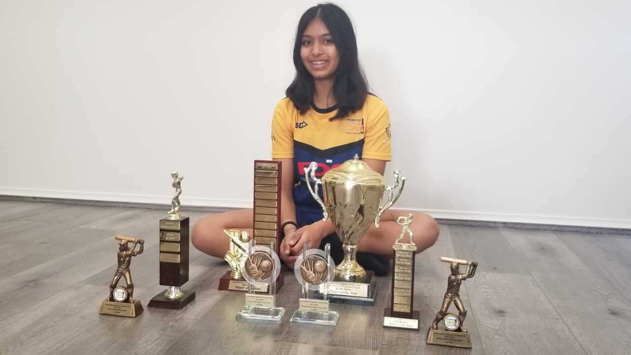 NSW cricketer Ira Patel with her awards.