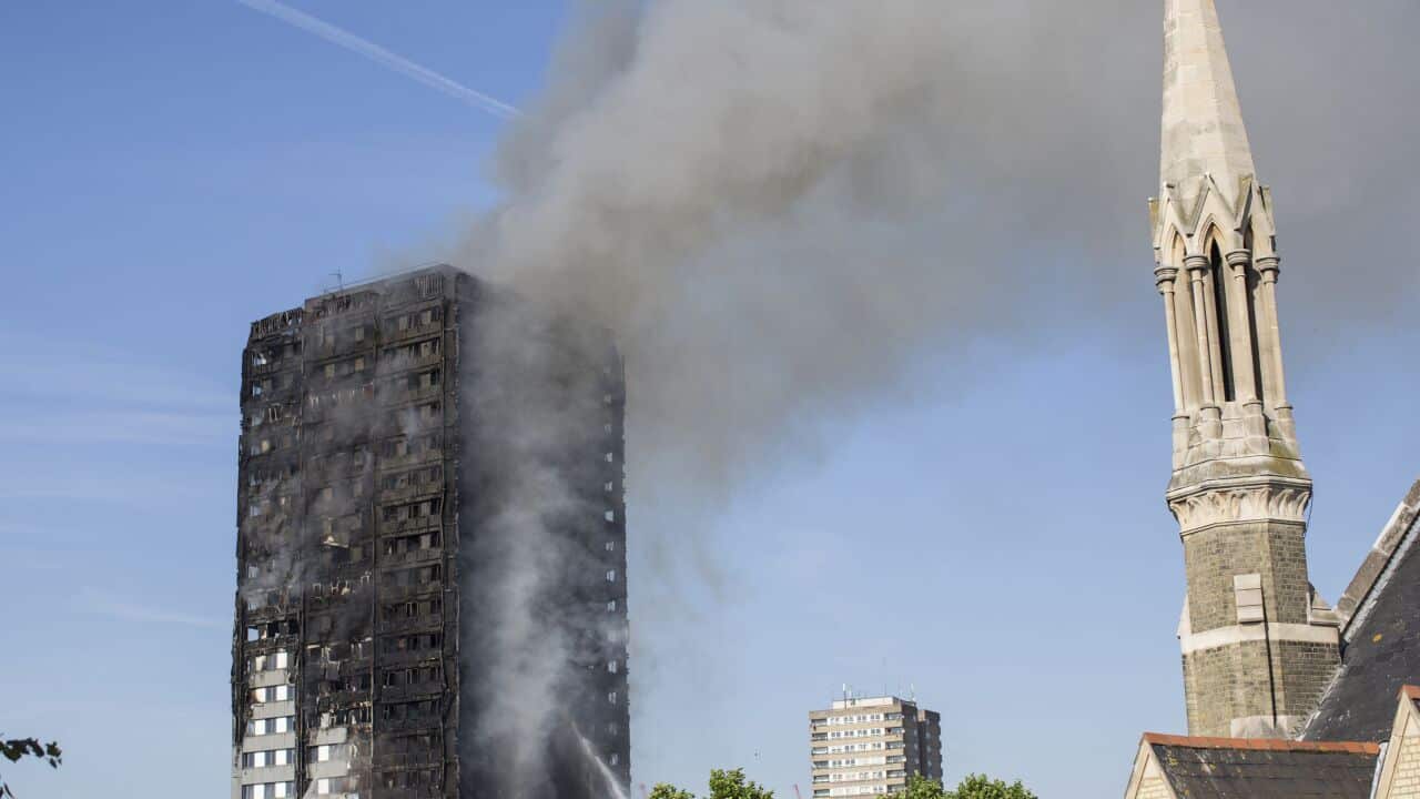 Smoke billows from a fire that has engulfed the 27-storey Grenfell Tower in west London.