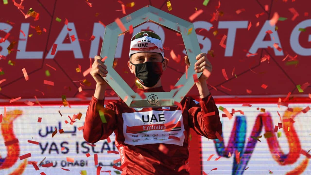 Tadej Pogacar of UAE Team Emirates celebrates his UAE Tour victory