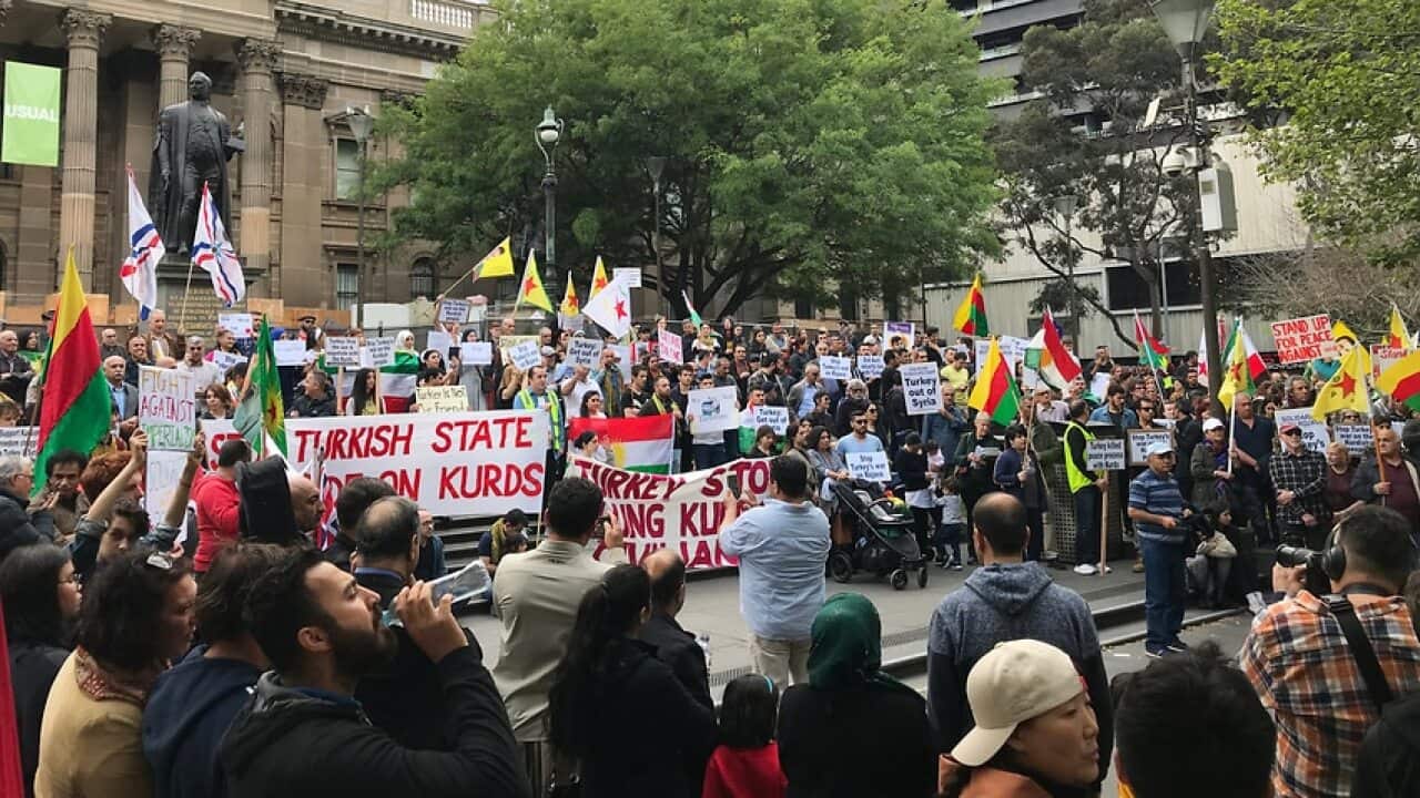 Demonstrators rally in Melbourne to show solidarity with Kurds affected by Turkey's incursion into northern Syria