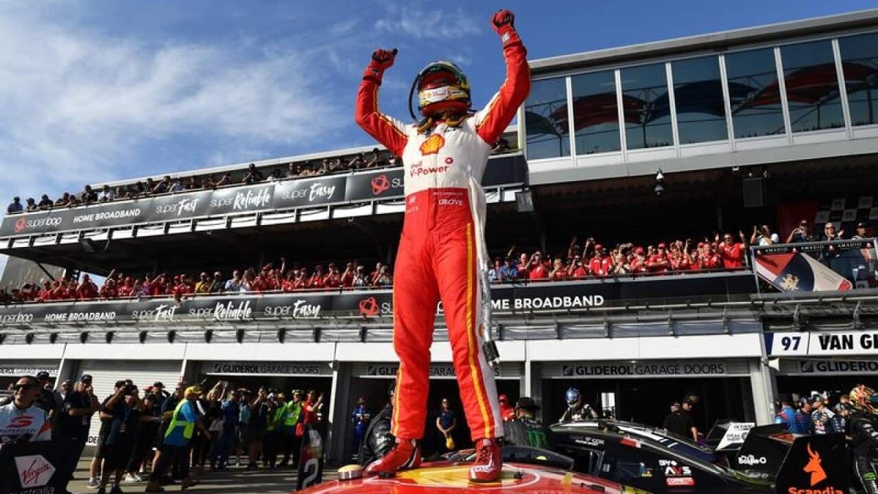 Scott McLaughlin from Shell V Power Racing celebrates after winning
