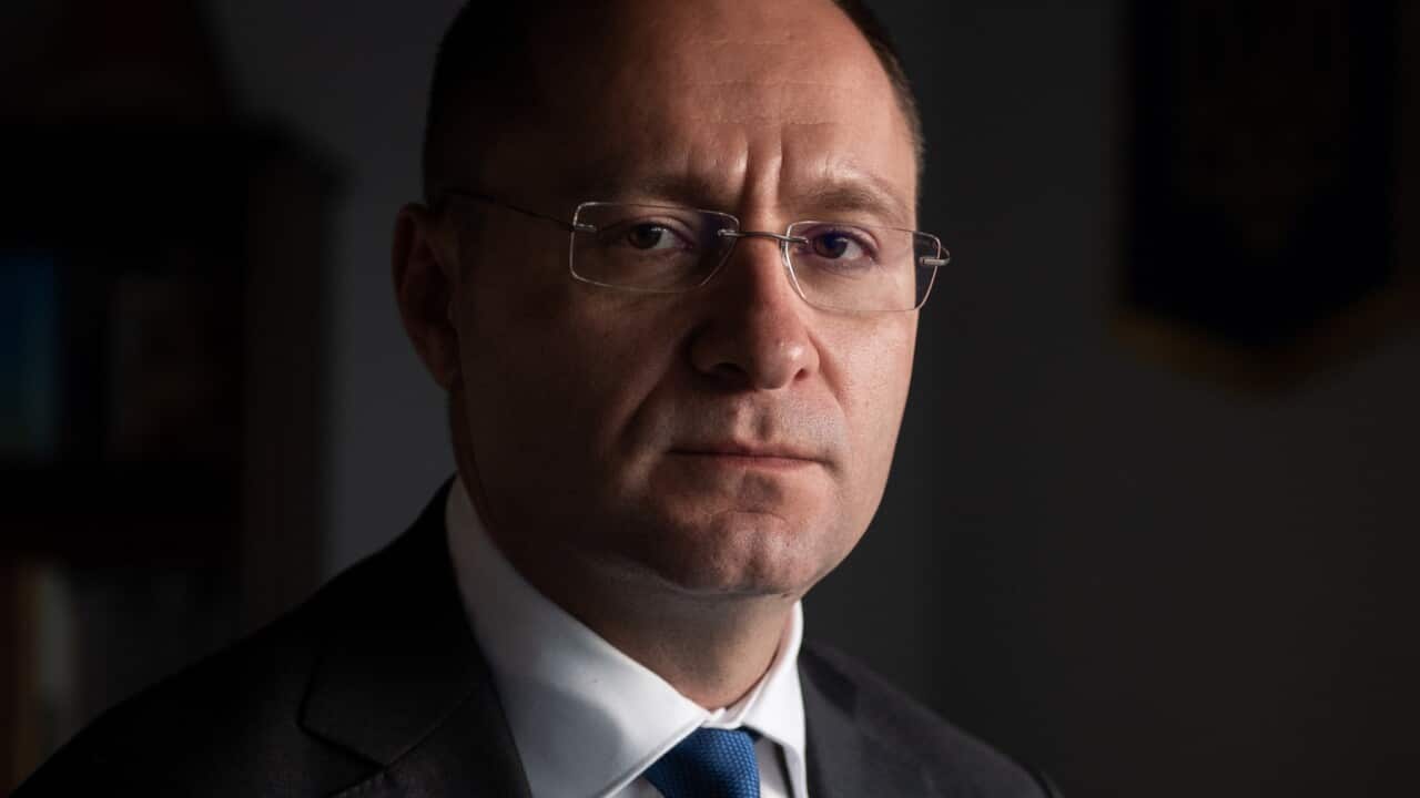 A man posing for a photo.