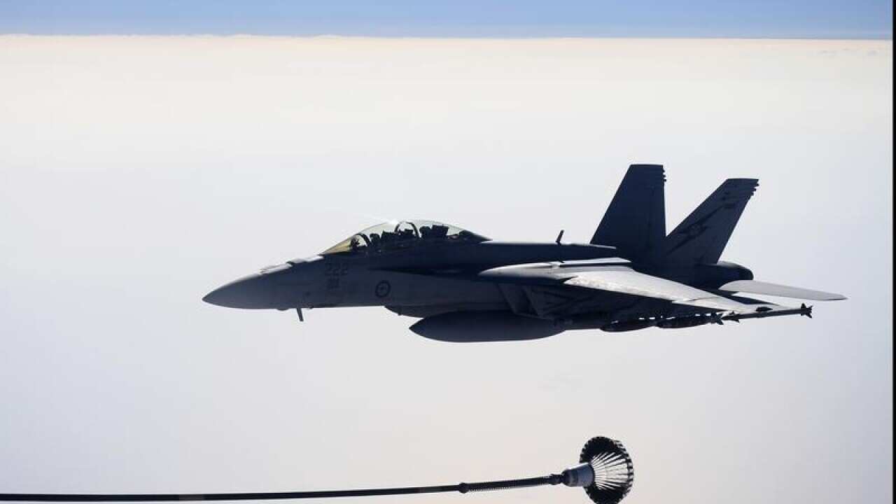 Super Hornet is seen after refuelling.