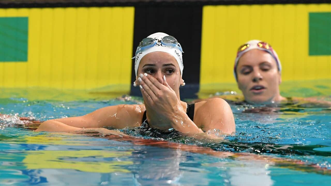 Kaylee McKeown reacts after setting a new World Record in the Womens 100m Backstroke Final at the Australian Swimming Trials for Tokyo Olympic and Paralympic Games qualification, at the SA Aquatic and Leisure Centre in Adelaide, Sunday, June 13, 2021. (AA