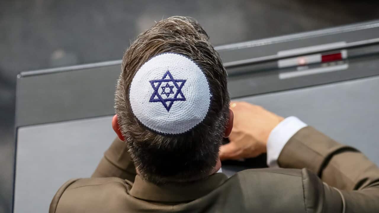 A kippah-wearing MP from the CDU/CSU parliamentary group attends a Bundestag session in Berlin, Germany, 26 April 2018.