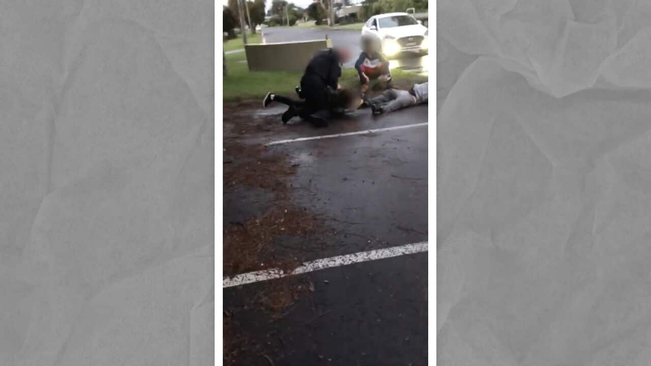 Video footage of a Batemans Bay police officer detaining Ethan Dowell-Grant after approaching him and his group of friends for swearing in public.