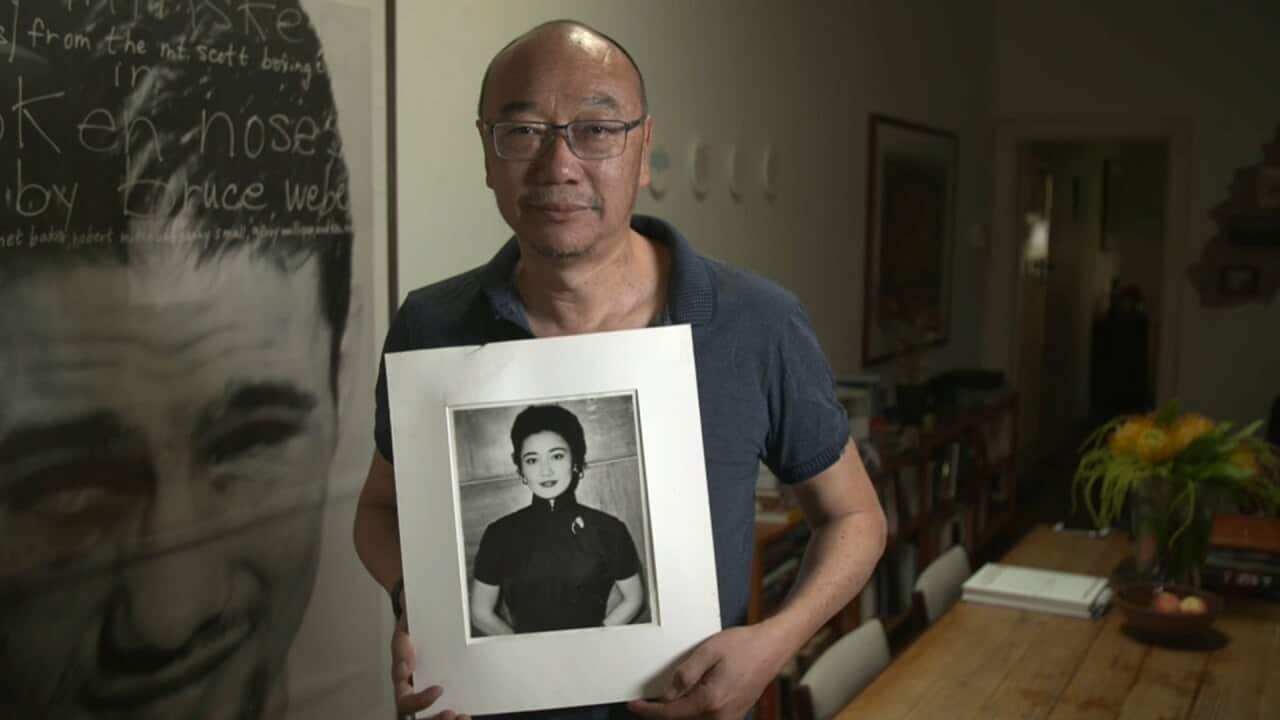 Tony Ayres with a photo of his mother.