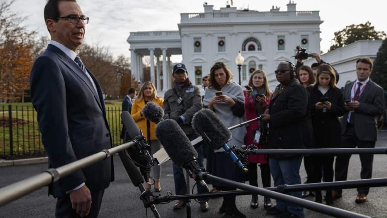 A file image of Steve Mnuchin talking to reporters