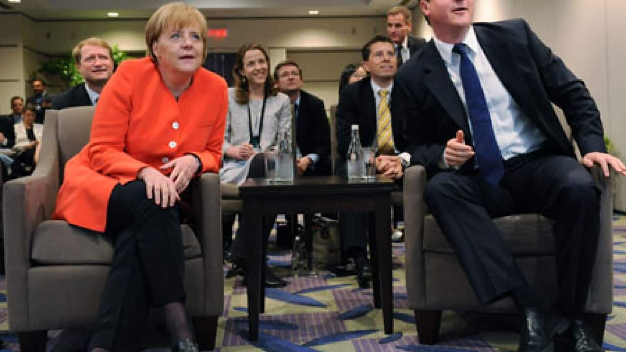 merkel_cameron_football_AAP_L_100626_183365817