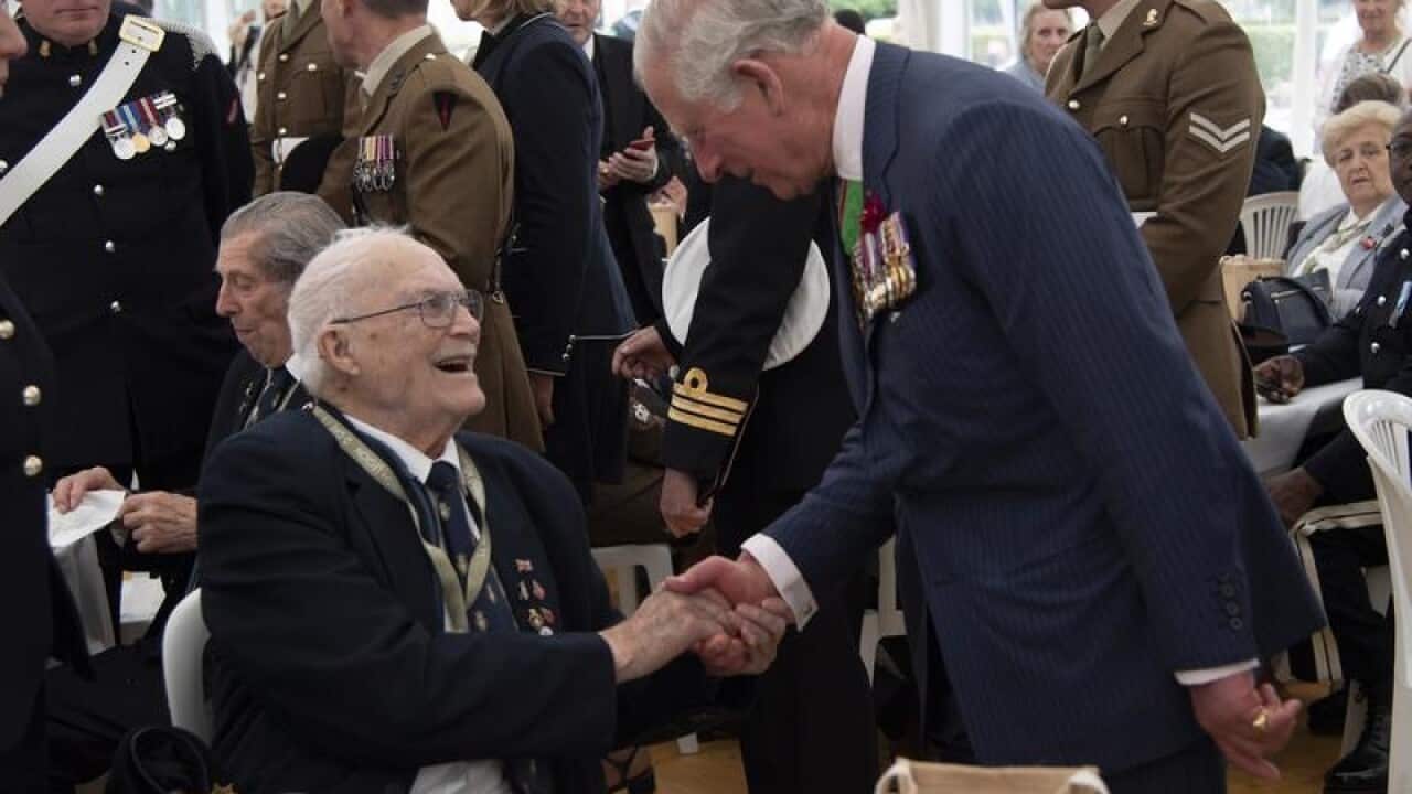Britain's Prince Charles and a war veteran