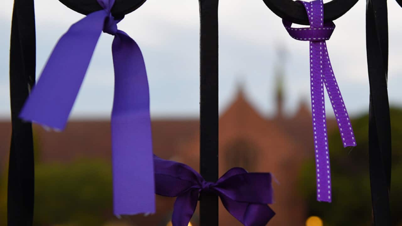 Purple ribbons as tributes to victims of abuse
