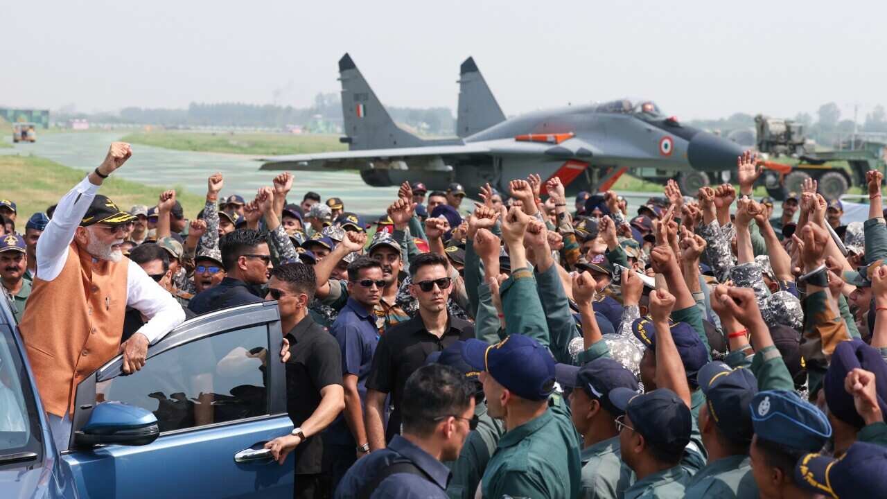 Indian Prime Minister Narendra Modi meets soldiers at Adampur Air Force base