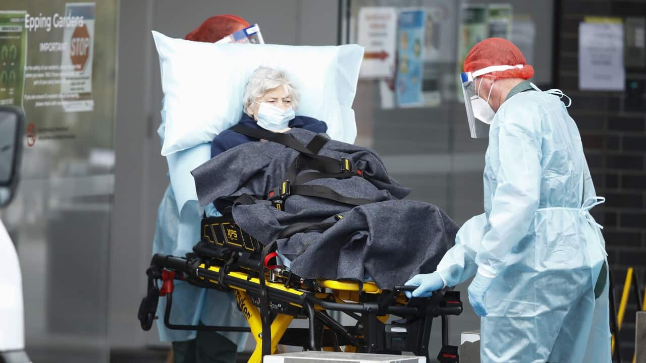A resident is taken away in an ambulance from Epping Gardens Aged Care Facility in Epping, Melbourne, Tuesday, July 28, 2020.