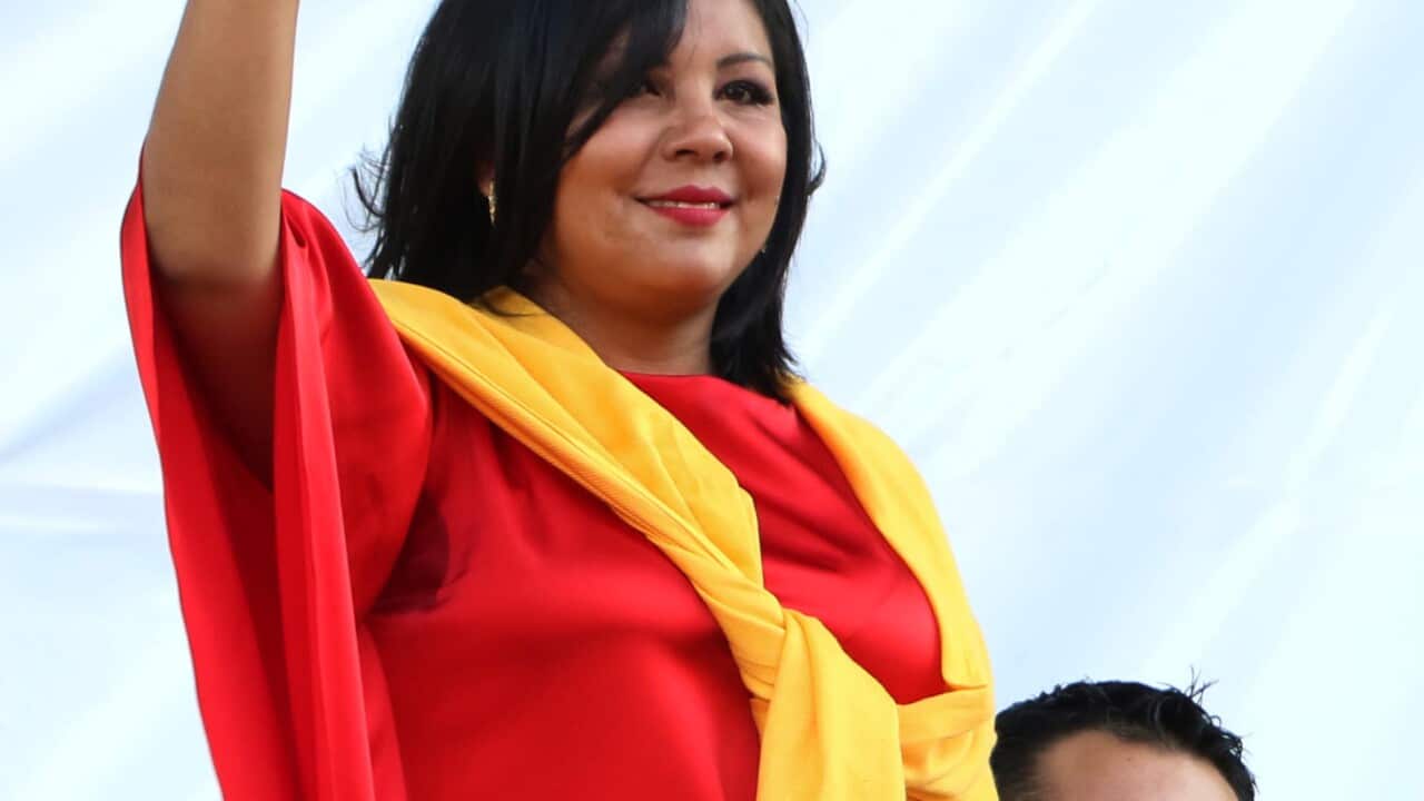 Gisela Mota waves during her swearing in ceremony as mayor of Temixco, Morelos State, Mexico