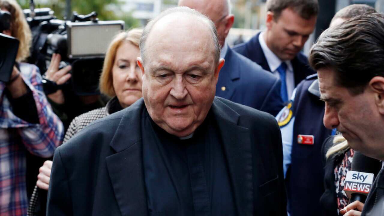 Archbishop Philip Wilson leaves Newcastle Local Court, in Newcastle after sentencing, Tuesday, July 3, 2018. The Adelaide Archbishop has been found guilty of concealing historical child sexual abuse. (AAP Image/Darren Pateman) NO ARCHIVING