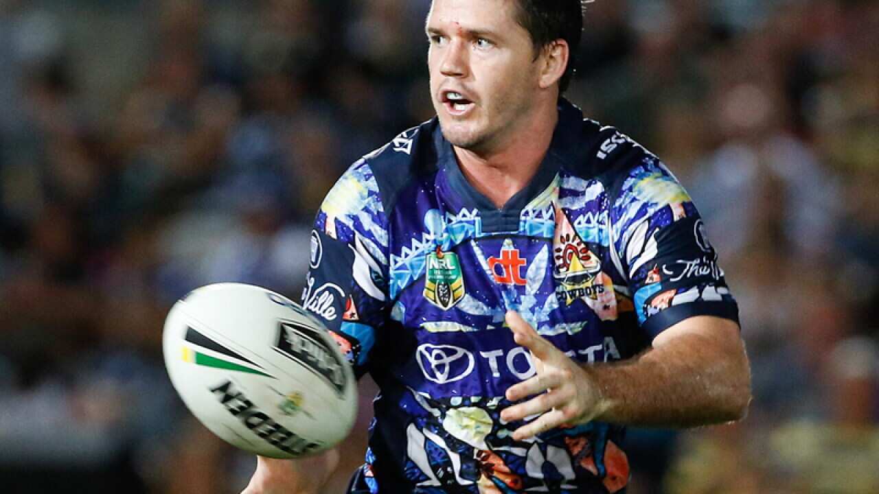 Cowboys' Lachlan Coote passes the ball
