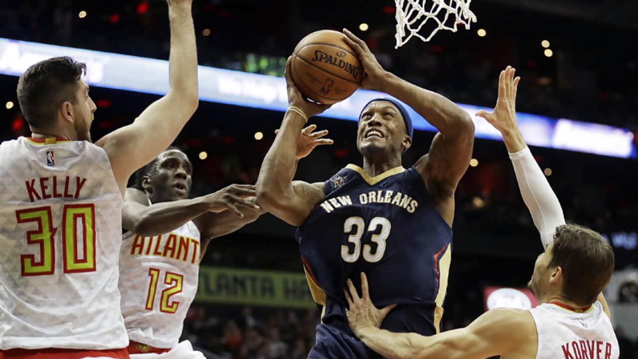 New Orleans Pelicans' Dante Cunningham (33) puts up a shot