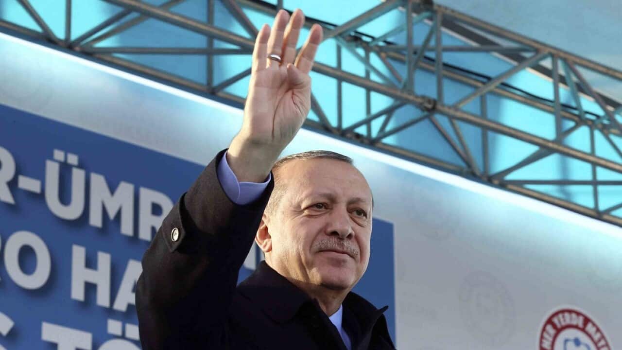 Turkey's President Recep Tayyip Erdogan waves to supporters during a rally in Istanbul, Friday, 15 December, 2017.
