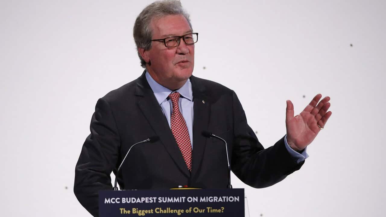 Former foreign minister Alexander Downer delivers his speech during the MCC Budapest Summit on Migration titled 'The Biggest Challenge of Our Time?'