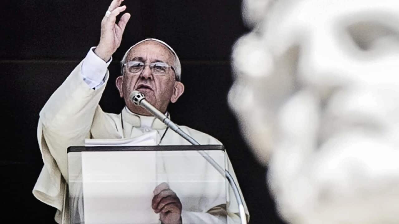 The Pope makes an address from his balcony.