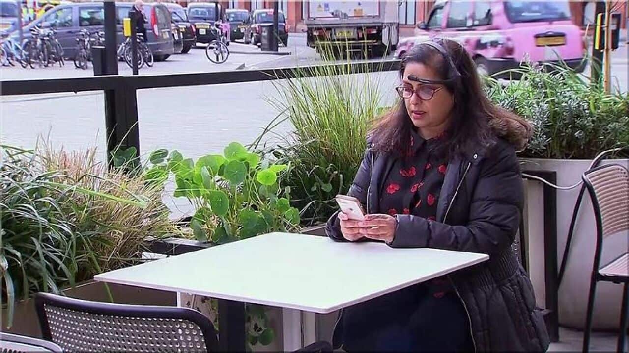 Shaheen Larrieux wearing a device that tracks her physical data