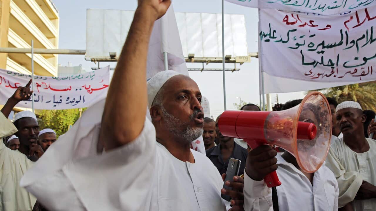 Rally in front of the Presidential Palace in Khartoum, Sudan.